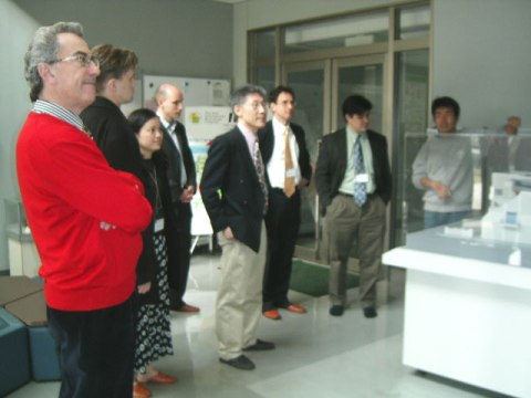 "The Penn delegation visits the High Voltage Electron Microscopy Station." Image