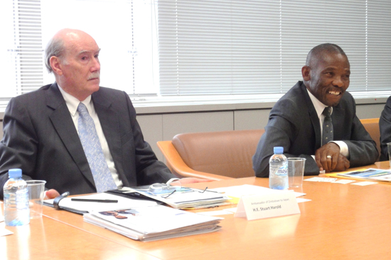 "Minister (right) and Ambassador discussing with the NIMS Executive Vice Presidents" Image