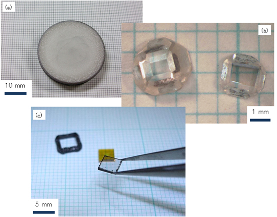 "Figure: Isotopically-enriched diamond crystals obtained by the new synthesis technique. (a) CVD polycrystalline diamond: Diamond with a thickness of 0.5mm was synthesized over the entire surface of a molybdenum disk (diameter: 30mm). (b) HPHT single crystal diamond: An attempt was made to further improve the isotopic ratio. (c) CVD single crystal diamond: High purity, high isotopic ratio single crystal diamond was synthesized on a widely-utilized single crystal substrate containing nitrogen (yellow), and this CVD single crystal and the substrate were later separated." Image